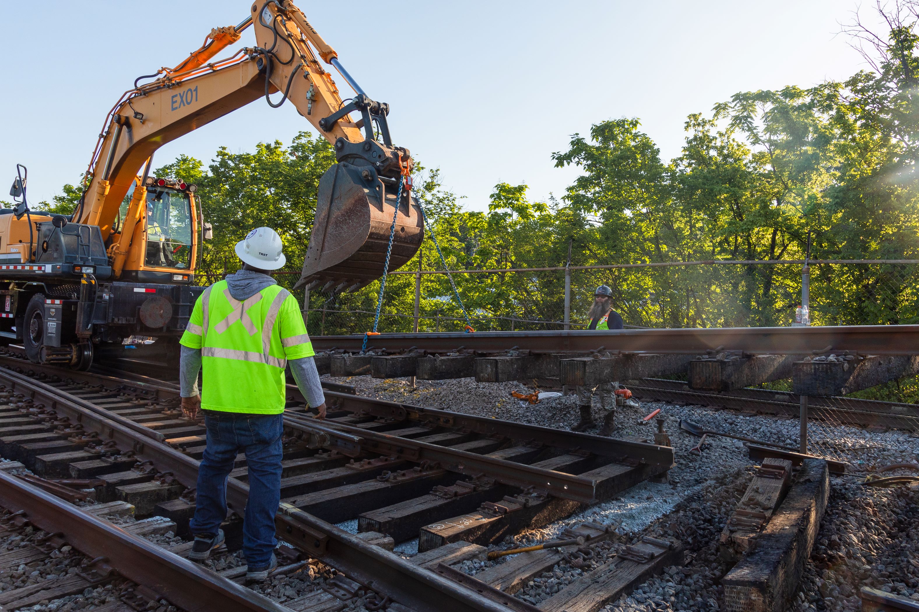 Crews replace rails along sections of the Red Line during the closure.