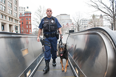MTPD K9 officer patrols Archives Metro station.