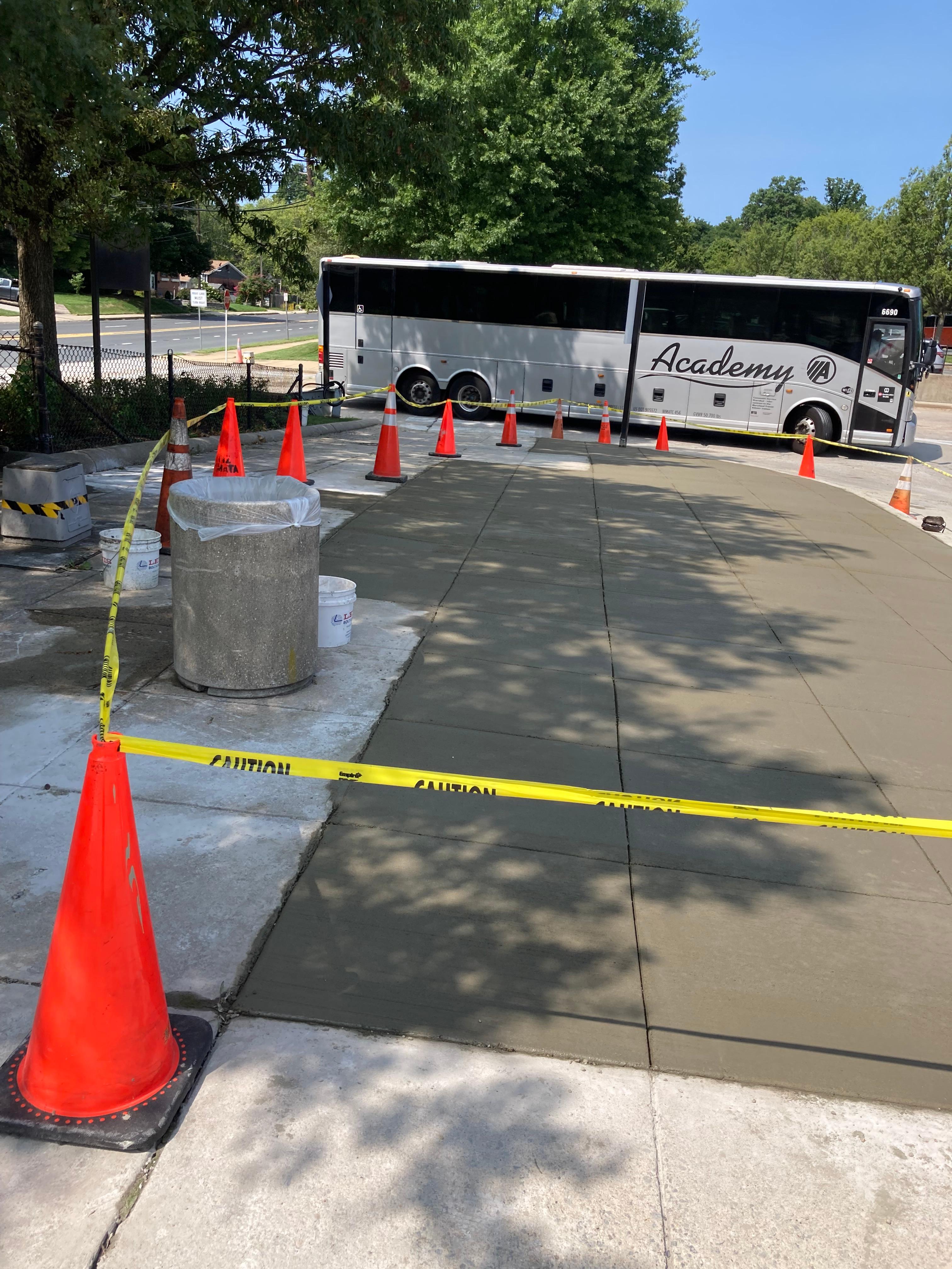 Crews replaced broken and uneven sidewalk at Forest Glen station.
