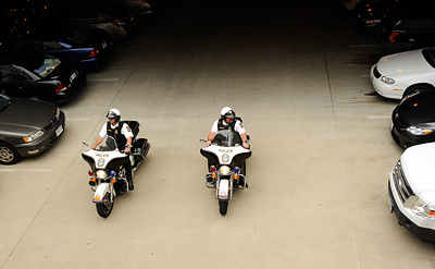 MTPD motorcycle officers patrol parking lots at Metro stations.