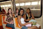 Riders travel in a Metrorail car along the Orange Line.