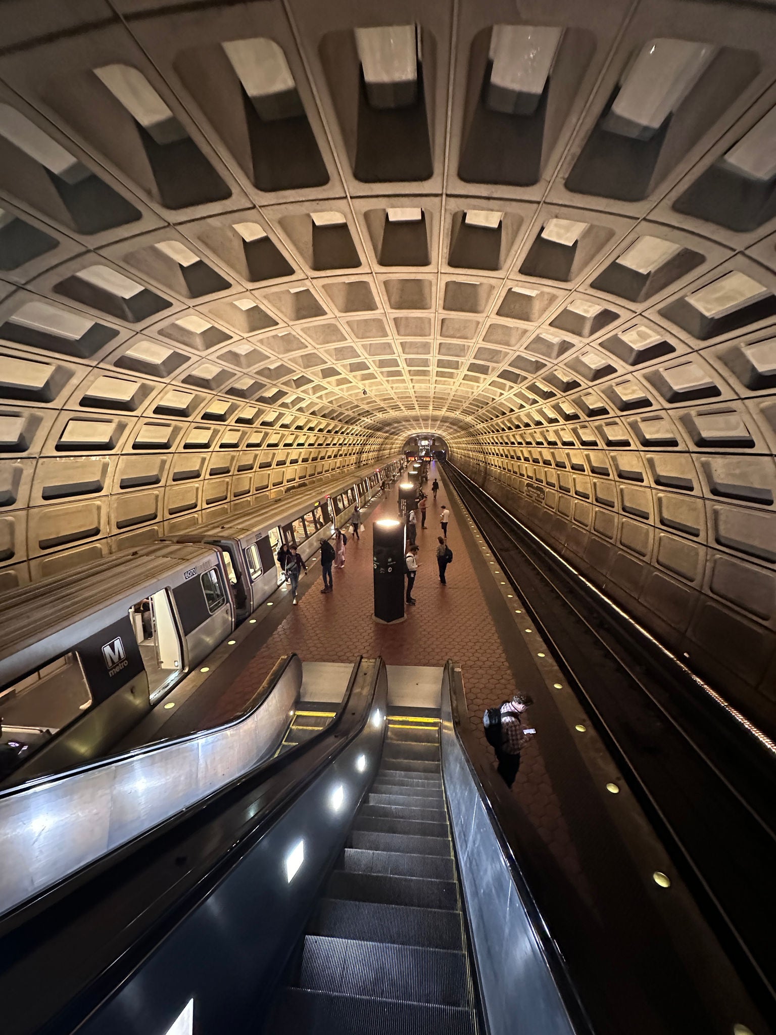 Metro station view from the top of an escalator