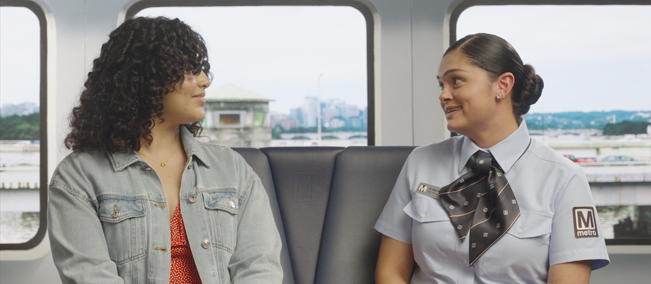 Annie speaks to a station manager