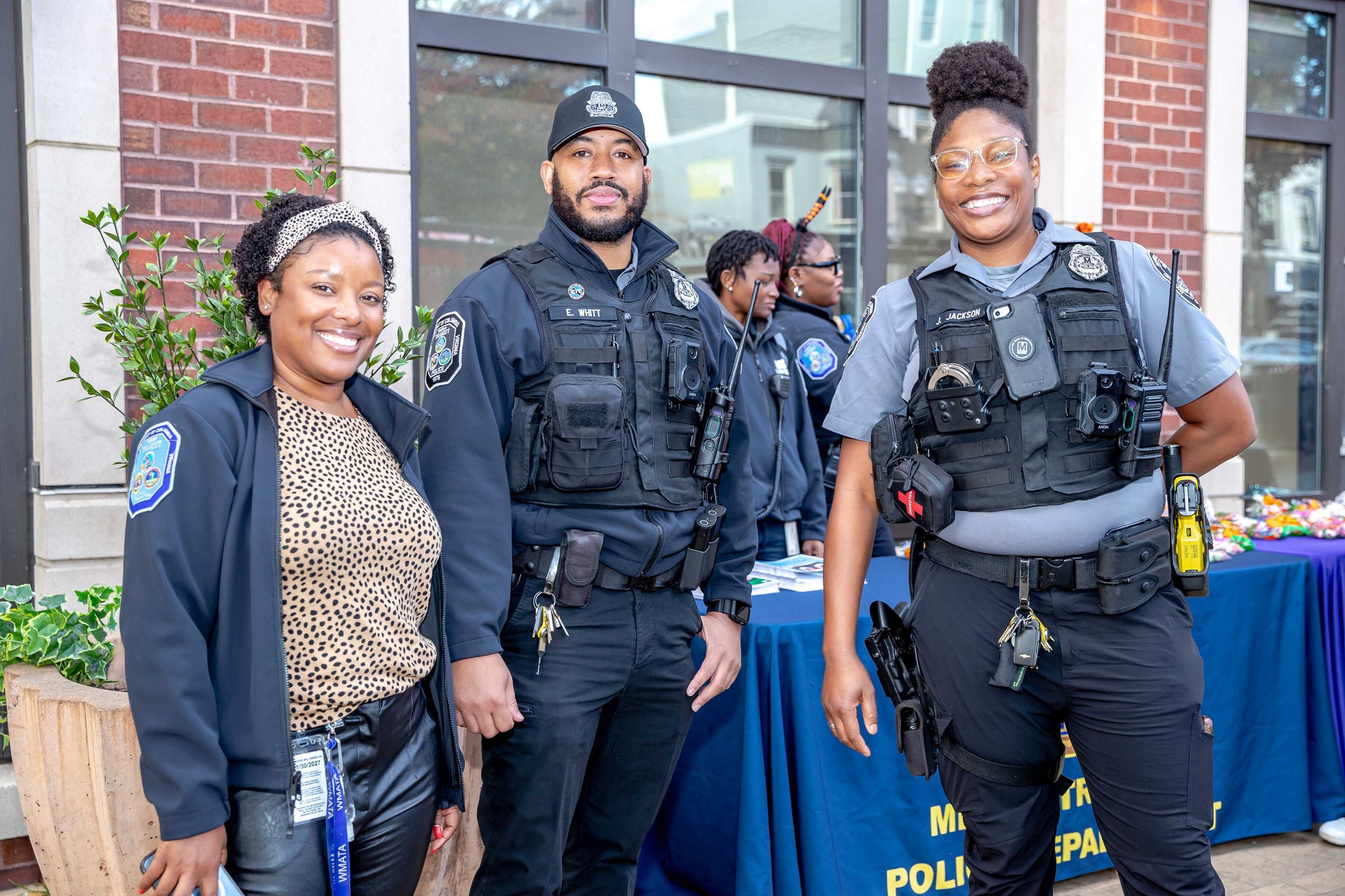 Three MTPD officers in uniform smiling