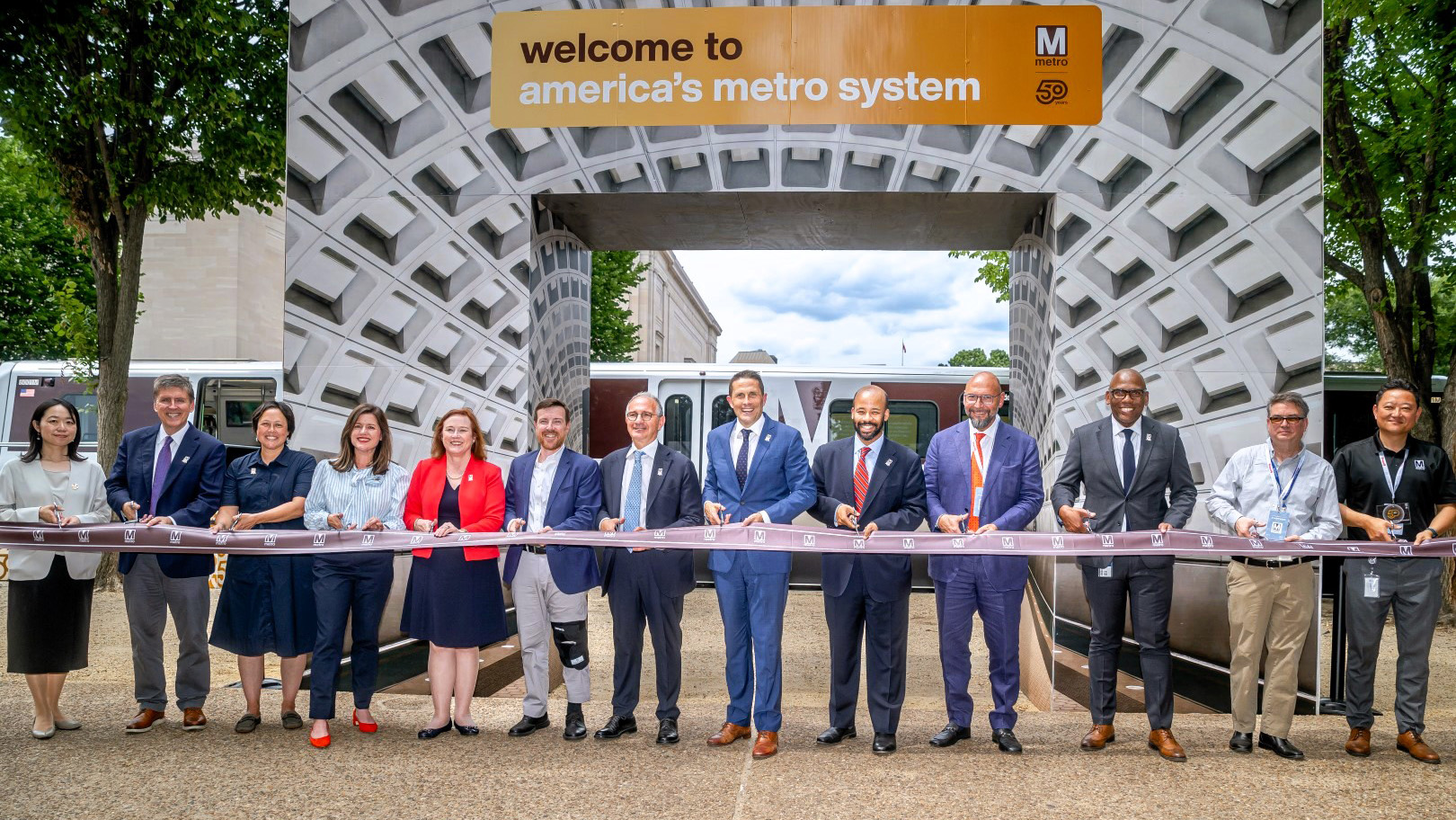 Randy clarke and leadership cut ribbon at GASF exhibit