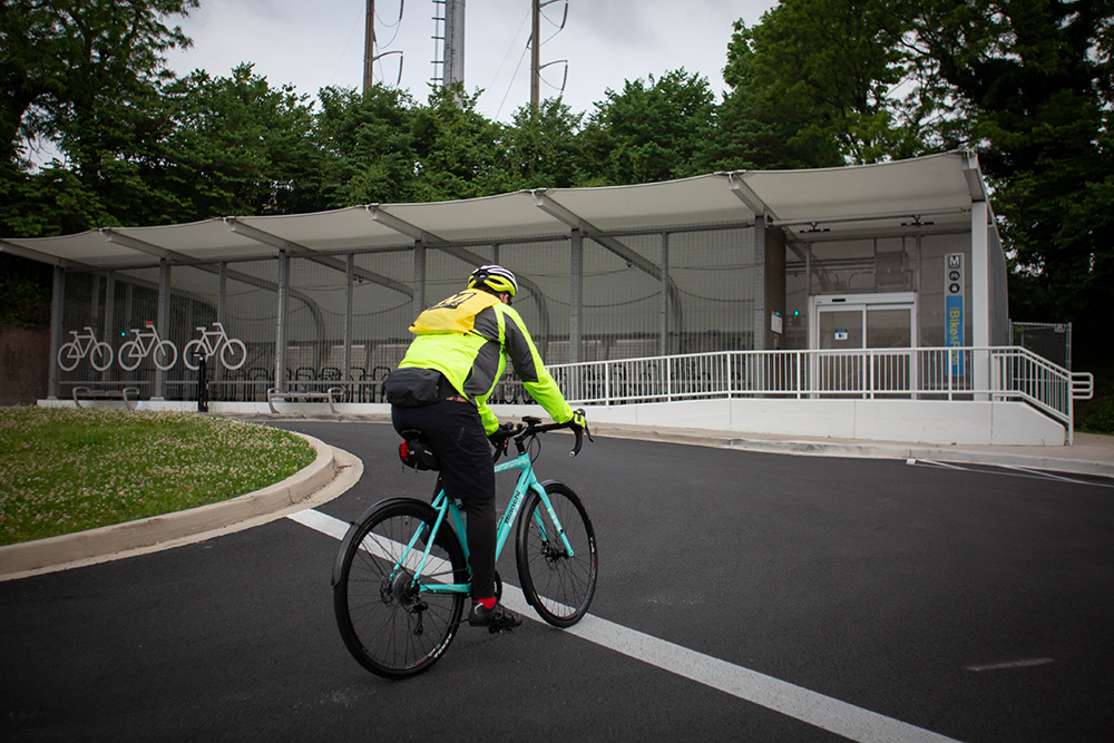 Bicyclist approaching Bike and Ride facility