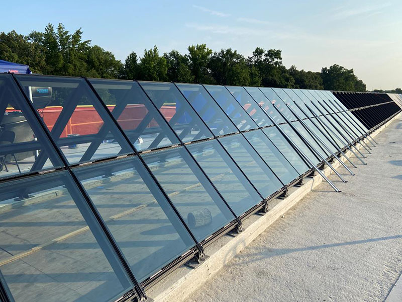 Greenbelt canopy with glass panels